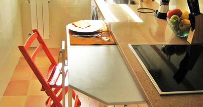 Как сэкономить за счёт кухонного стола интерьерное пространство